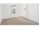 Cozy carpeted bedroom featuring a window and neutral decor at 9160 Anthem Ave, Plainfield, IN 46168