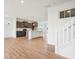 Modern kitchen with stainless steel appliances, an island, and pendant lighting at 9160 Anthem Ave, Plainfield, IN 46168