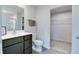 Modern bathroom with stylish vanity, white countertops, and a convenient toilet, offering functionality and style at 9829 Hulton Rd, Pendleton, IN 46064