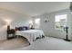 Bright bedroom with two windows, neutral walls, and soft carpet, creating a relaxing atmosphere at 9829 Hulton Rd, Pendleton, IN 46064