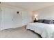 Cozy bedroom featuring soft carpet, neutral decor, and comfortable bedding for a restful retreat at 9829 Hulton Rd, Pendleton, IN 46064