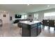 Open living space with kitchen island, dining area, and comfortable lounge at 9829 Hulton Rd, Pendleton, IN 46064