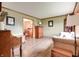 Open-concept living room with hardwood floors and views into the dining area at 1004 Nevelle Ln, Carmel, IN 46032