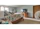 Comfortable main bedroom with a window and a TV on a wooden dresser at 1004 Nevelle Ln, Carmel, IN 46032