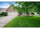 Charming single-Gathering home featuring a well-manicured lawn and inviting curb appeal at 11040 Brave Ct, Indianapolis, IN 46236