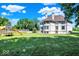 Large, lush backyard with a playset and plenty of room to play, perfect for families and relaxation at 11575 Freeport Dr, Carmel, IN 46032
