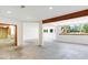 Spacious basement area with exposed wooden beams and bright recessed lighting at 11575 Freeport Dr, Carmel, IN 46032