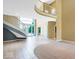 Grand foyer with soaring ceilings, a curved staircase, and a flood of natural light, creating a welcoming entrance at 11575 Freeport Dr, Carmel, IN 46032