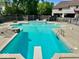 Beautiful pool with clear water and a diving board, perfect for summertime fun and relaxation at 11575 Freeport Dr, Carmel, IN 46032