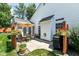 Outdoor patio featuring a dining set and grill for entertaining, all surrounded by green lawn at 11692 Seven Oaks Dr, Fishers, IN 46038