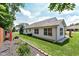Well-maintained backyard, complemented by lush landscaping and a brick-lined flower bed at 11692 Seven Oaks Dr, Fishers, IN 46038