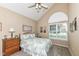 Bedroom features a vaulted ceiling and a large window at 11692 Seven Oaks Dr, Fishers, IN 46038