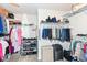Spacious walk-in closet with ample shelving and hanging space for clothing and accessories at 11692 Seven Oaks Dr, Fishers, IN 46038
