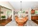 Comfortable dining room with hardwood floors and natural light, showcasing the room's charm at 11692 Seven Oaks Dr, Fishers, IN 46038