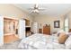 Comfortable primary bedroom with an ensuite bathroom and well-designed closet spaces at 11692 Seven Oaks Dr, Fishers, IN 46038