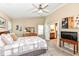 Well-lit primary bedroom with an ensuite bathroom and closet at 11692 Seven Oaks Dr, Fishers, IN 46038