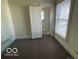 Bedroom featuring ample light and neutral walls and carpet at 1304 Franklin St, Columbus, IN 47201