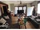 Inviting living room with hardwood floors, comfortable seating, and plenty of natural light at 1304 Franklin St, Columbus, IN 47201