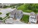 Beautiful aerial view of townhomes with an adjacent community park, streetscape and walking paths at 13048 Minden Dr, Fishers, IN 46037