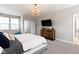 Spacious bedroom with large windows and stylish chandelier at 13048 Minden Dr, Fishers, IN 46037