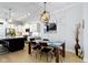Dining room has decorative lighting, a breakfast nook and an adjacent kitchen at 13048 Minden Dr, Fishers, IN 46037