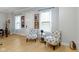 Entryway features hardwood floors and decoratively framed photos on the wall at 13048 Minden Dr, Fishers, IN 46037