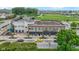 Commercial building featuring retail space, including a fitness center, with well-maintained exterior at 13048 Minden Dr, Fishers, IN 46037
