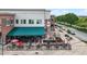 Charming pizzeria with awning and outdoor seating at the Bonn Building, providing a delightful dining experience at 13048 Minden Dr, Fishers, IN 46037