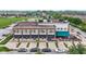 Commercial building featuring retail space, including a spa, with well-maintained exterior at 13048 Minden Dr, Fishers, IN 46037