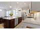 Bright kitchen with granite counters, stainless appliances, an island with breakfast bar and decorative accents at 13048 Minden Dr, Fishers, IN 46037