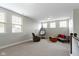 Bright and airy loft featuring modern furniture, great natural light, and ample open space at 13048 Minden Dr, Fishers, IN 46037