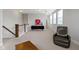 Spacious loft with comfortable seating, ample natural light, and a cozy atmosphere at 13048 Minden Dr, Fishers, IN 46037