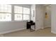Bright office space featuring ample natural light from large windows and a modern desk setup at 13048 Minden Dr, Fishers, IN 46037