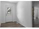 Clean, bright entryway with a view of the exterior through a glass door at 1311 N Eaton Ave, Indianapolis, IN 46219