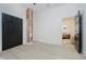 Bright bedroom featuring light floors, large closet, and modern design elements at 1318 Hoyt Ave, Indianapolis, IN 46203