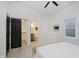 Bedroom featuring access to ensuite bathroom and closet; with ample natural light at 1318 Hoyt Ave, Indianapolis, IN 46203