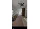 An in-progress home remodeling project is shown featuring new floors and large windows at 1318 Hoyt Ave, Indianapolis, IN 46203