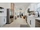 Modern kitchen with stainless steel appliances that opens up to an open floor plan at 1318 Hoyt Ave, Indianapolis, IN 46203