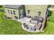 Cozy backyard patio with outdoor seating, a hot tub, and grill, perfect for entertaining at 13485 Mancroft Dr, Fishers, IN 46037