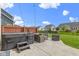 Backyard with a hot tub, patio seating, and lush green lawn, perfect for outdoor relaxation and entertaining at 13485 Mancroft Dr, Fishers, IN 46037