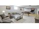 Spacious finished basement area with a poker table and comfortable seating at 13485 Mancroft Dr, Fishers, IN 46037