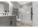 Modern bathroom with a glass-enclosed shower, sleek vanity, and stylish finishes, offering a spa-like experience at 13485 Mancroft Dr, Fishers, IN 46037