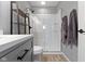Elegant bathroom with a glass-enclosed shower, vanity, and modern fixtures, providing a luxurious and functional space at 13485 Mancroft Dr, Fishers, IN 46037