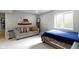 Cozy bedroom features a comfortable couch, and window providing natural light, creating a welcoming and relaxing space at 13485 Mancroft Dr, Fishers, IN 46037