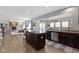 Open kitchen design with granite counters, stainless appliances, and seamless transition to the living area at 13485 Mancroft Dr, Fishers, IN 46037