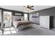 Comfortable main bedroom featuring a large bed, stylish dresser, and gray walls at 13485 Mancroft Dr, Fishers, IN 46037