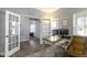 Bright home office featuring french doors, desk, and natural light from the window at 13485 Mancroft Dr, Fishers, IN 46037