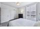 Cozy bedroom featuring a dresser and a window at 14458 Carlow Run, Carmel, IN 46074