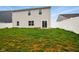 Picture of a spacious backyard featuring a well-maintained lawn and a privacy fence at 1454 Silver Pine Ln, Sheridan, IN 46069
