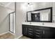 Bathroom boasts a double sink vanity, modern fixtures, and a glass enclosed shower at 1454 Silver Pine Ln, Sheridan, IN 46069